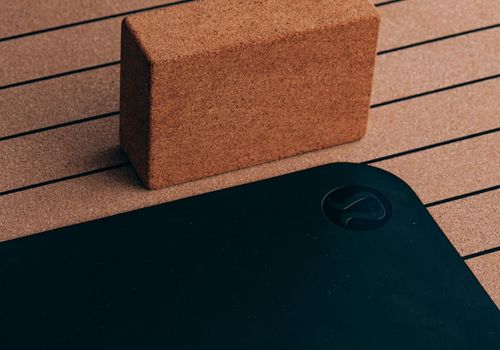 Minimalist wooden blocks and organic mats for yoga practice